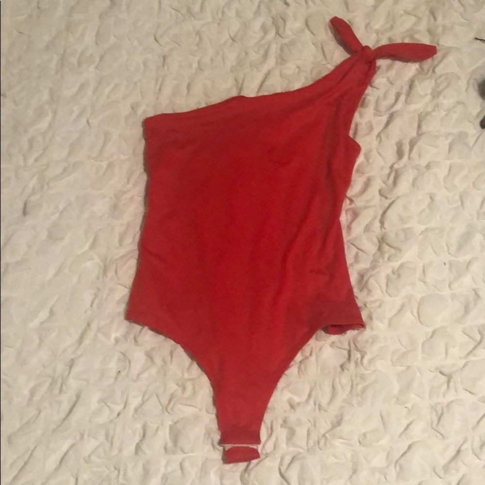 Red one shoulder bodysuit